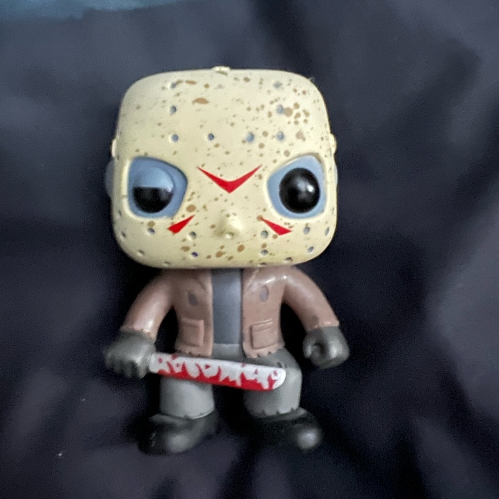 Funko Pop Figure with Beige and Brown Colors